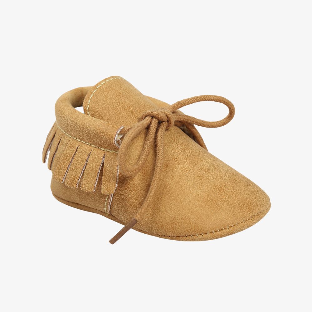 Mocasines con cordones y flecos para bebé
