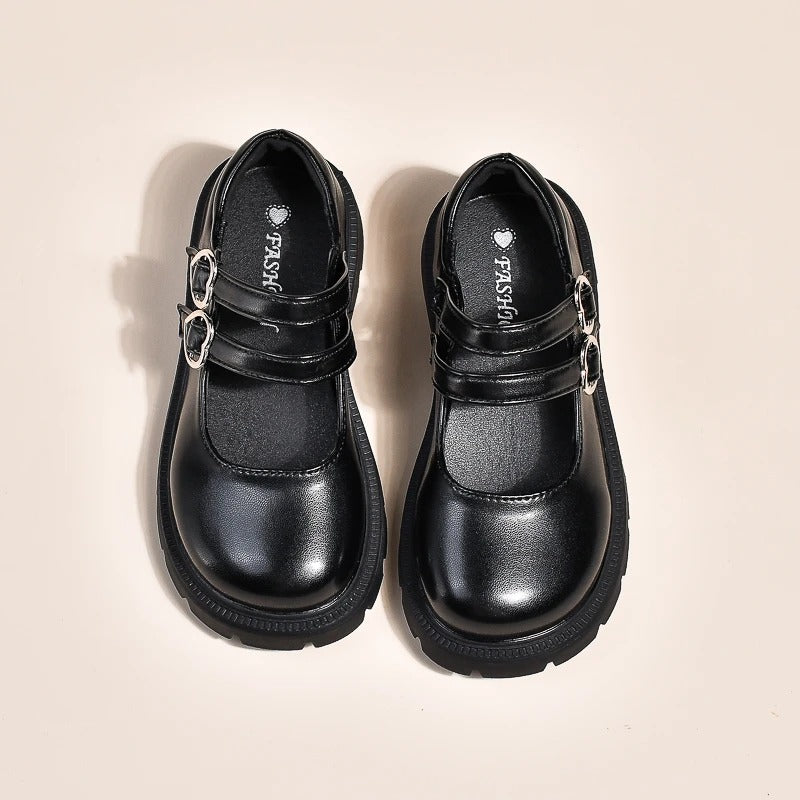 Mocasines negros de moda para niña con doble hebilla
