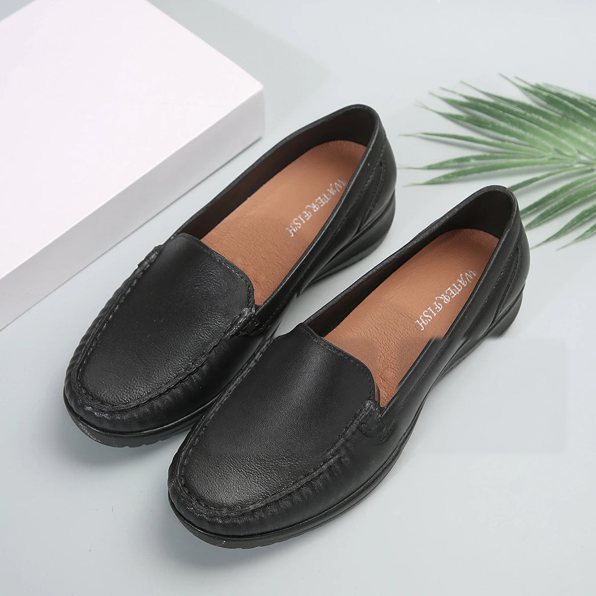 Mocasines de mujer en blanco y negro