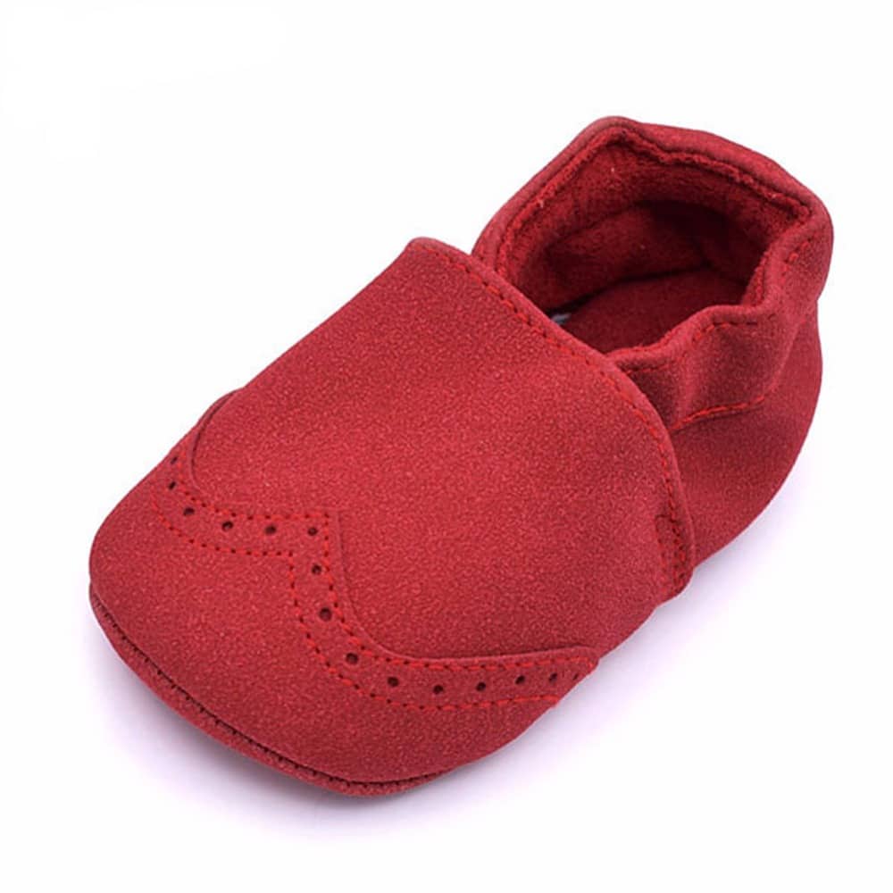 Pequeño mocasín de cuero para bebé
