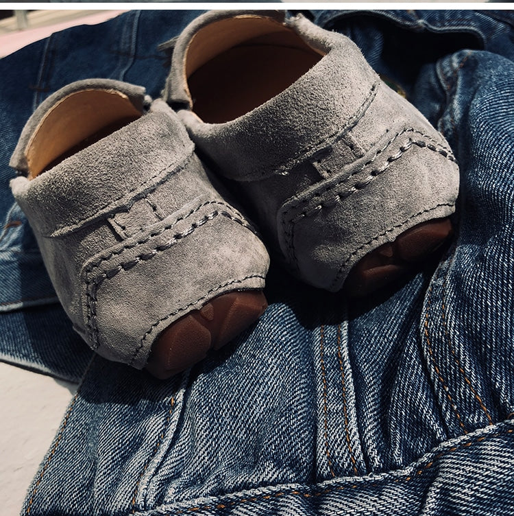 Mocasines indios de ante con borlas