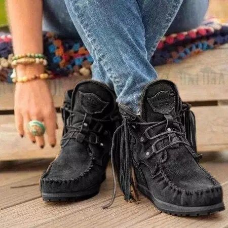 Mocasines indios con cordones y flecos