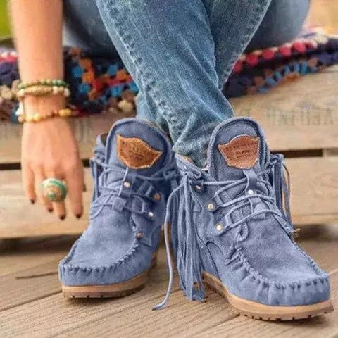 Mocasines indios con cordones y flecos