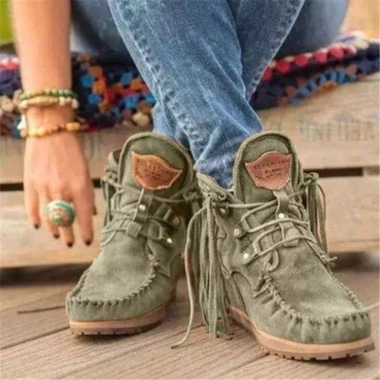 Mocasines indios con cordones y flecos