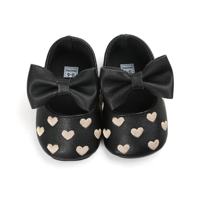 Mocasines para bebé niña con motivo de corazón