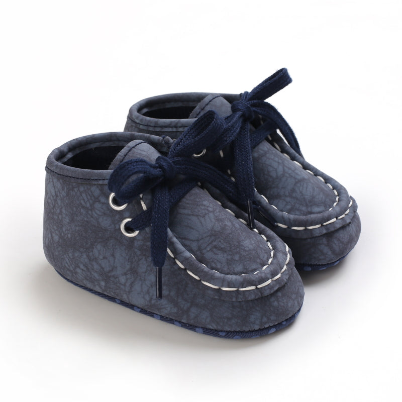 Mocasines altos con cordones en material efecto craquelado para bebé niño