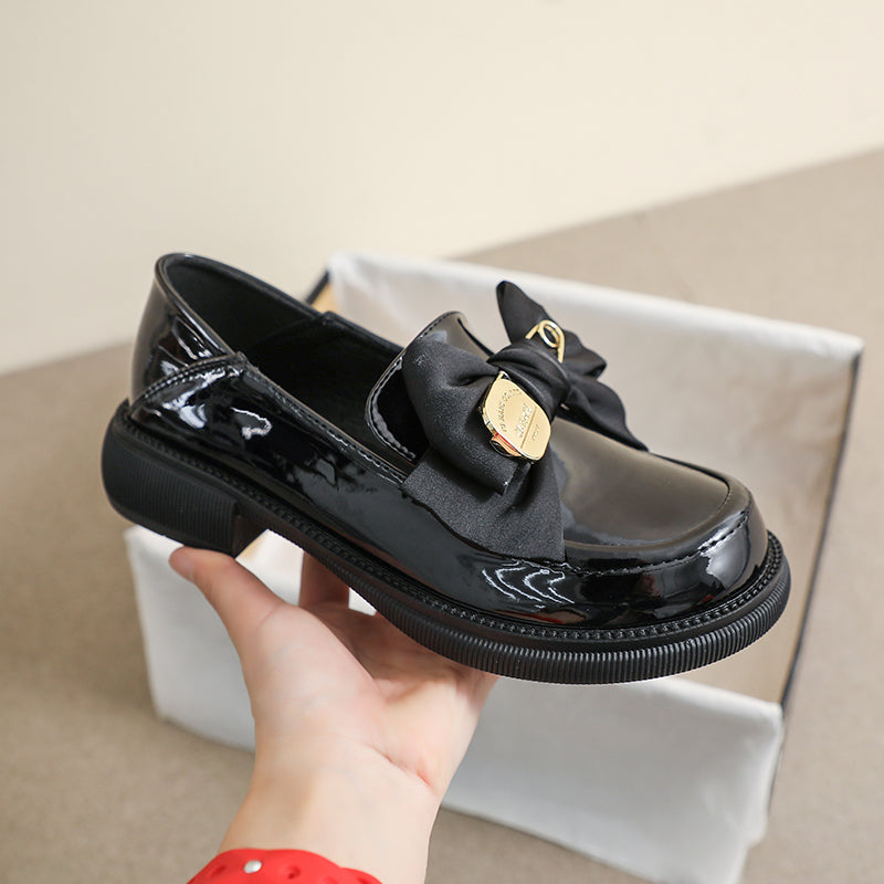 Mocasines negros estilo británico con lazo de mariposa para mujer