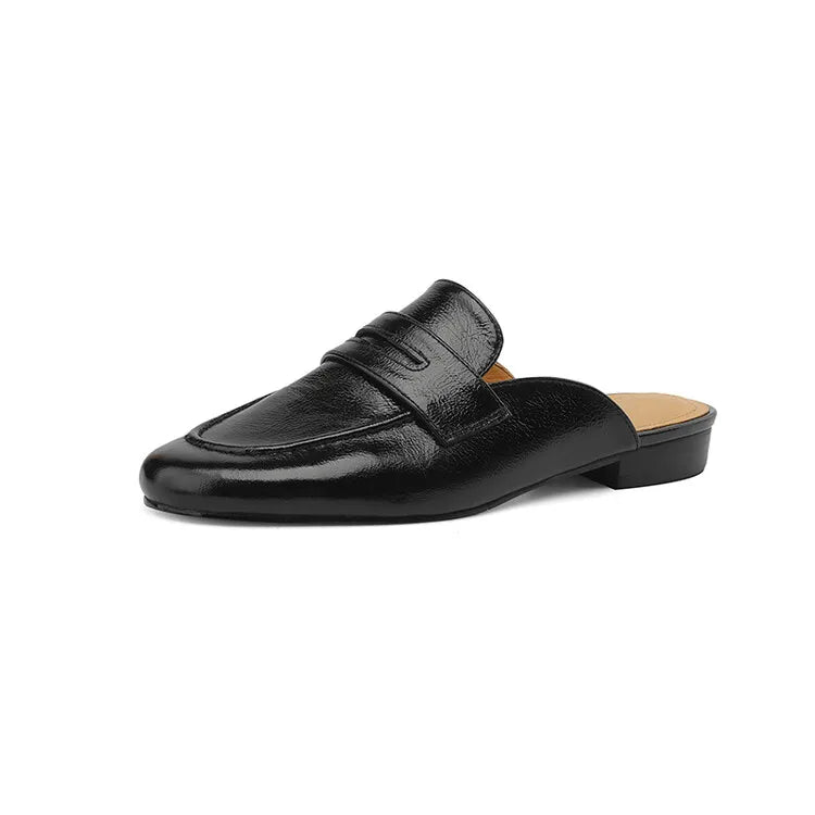 Mule mocasín penny de mujer negra