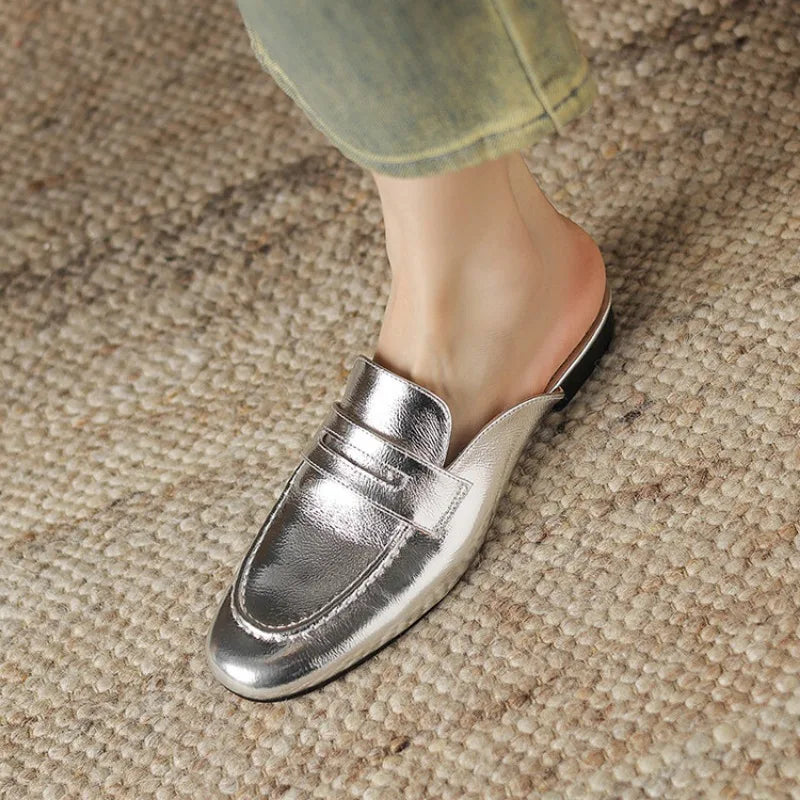 Mule mocasín penny de mujer dorada