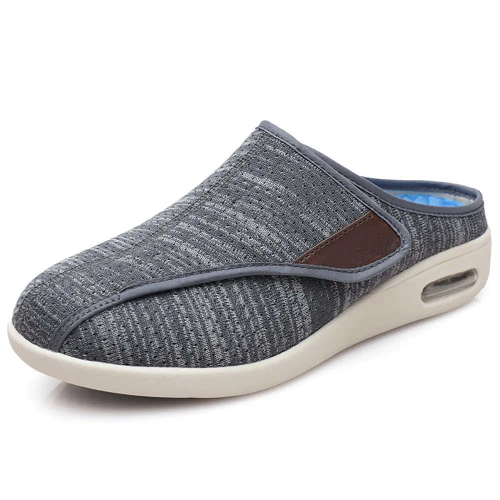 Mules ortopédicos con velcro en malla jaspeada, color negro, detalle de la suela