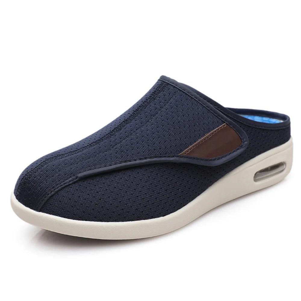 Mules ortopédicos con velcro en malla transpirable, color negro, detalle de la suela