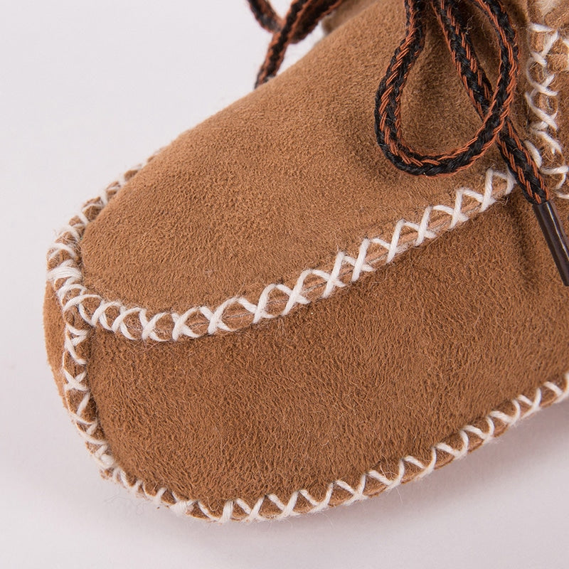 Botines mocasines indios de cuero y piel para bebé