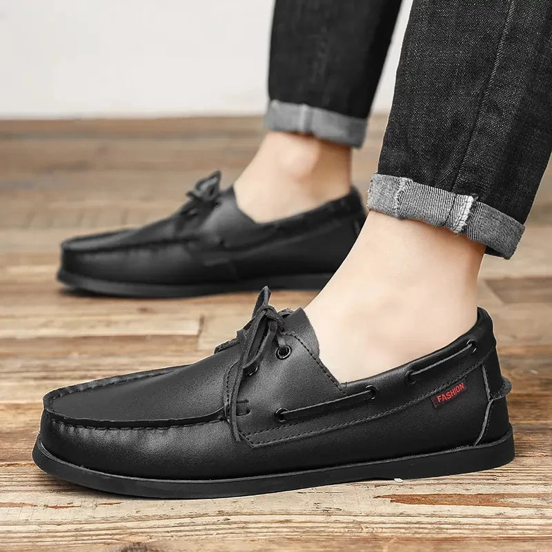 Zapato náutico de hombre negro con cordones en piel, par completo