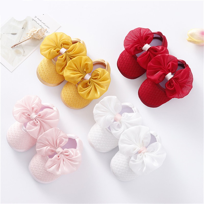 mocasín bebé rosa amarillo blanco y rojo